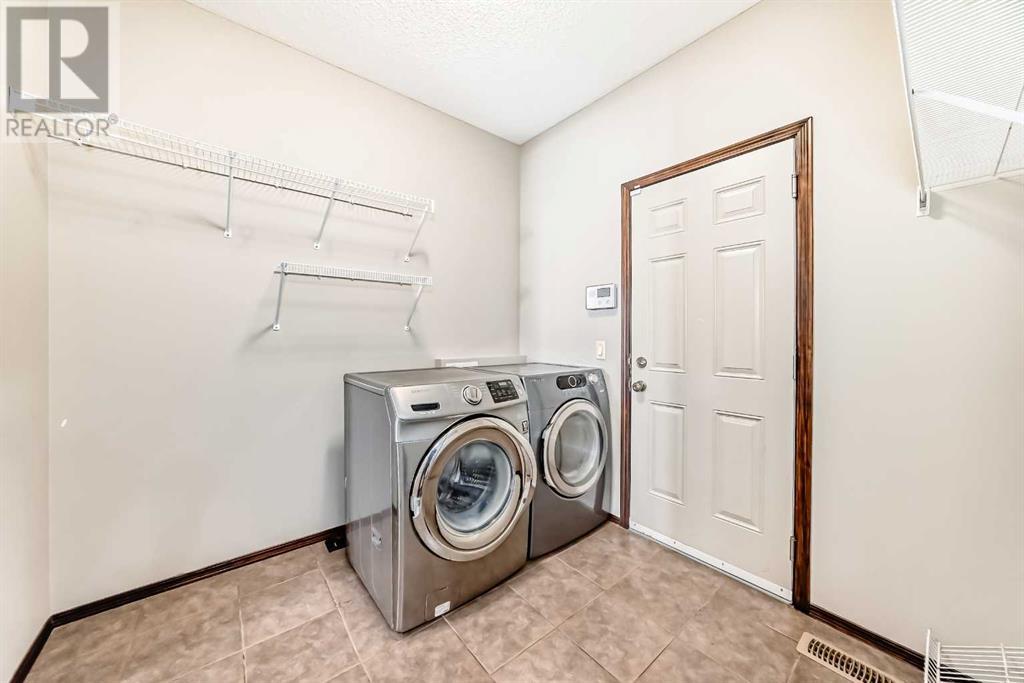 Single Family House for Sale in  Everbrook Drive SW Evergreen Calgary 