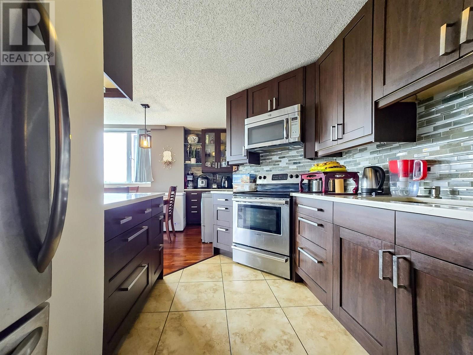 Photo 3 of 708 3980 Carrigan Court, Burnaby BC