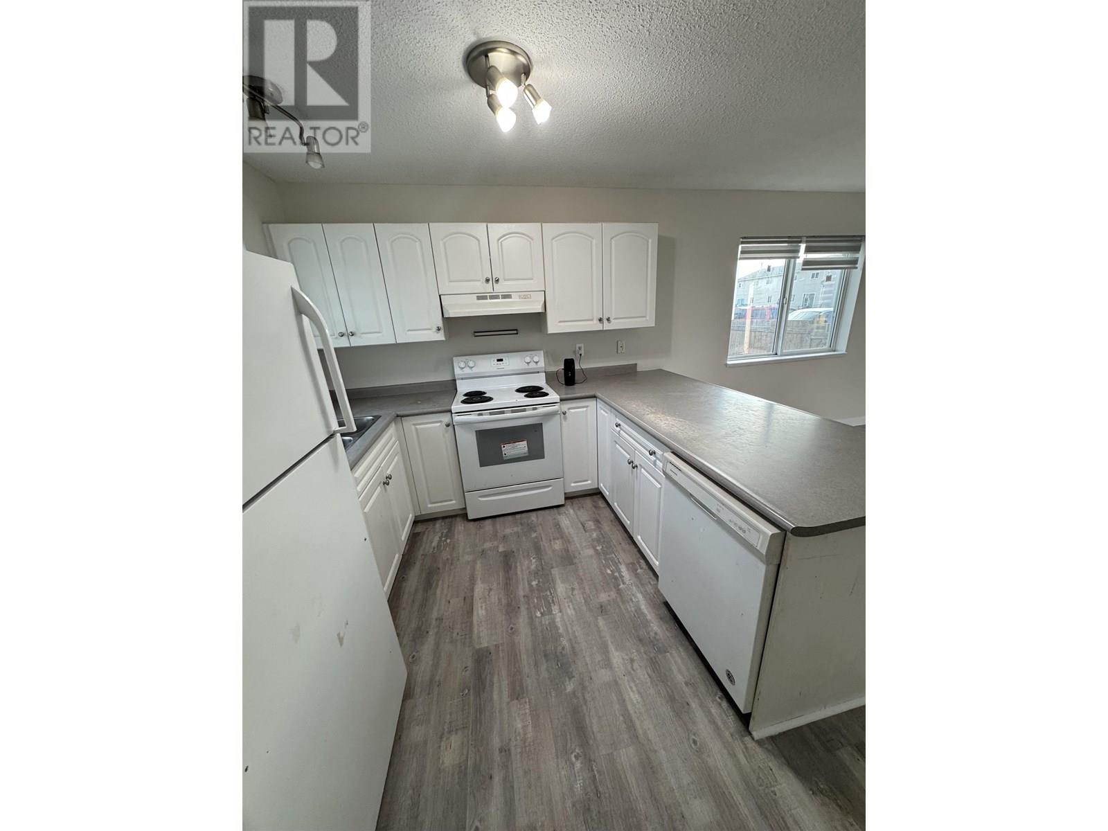Photo 4 of 8807 8809 101 Avenue, Fort St John City Se BC