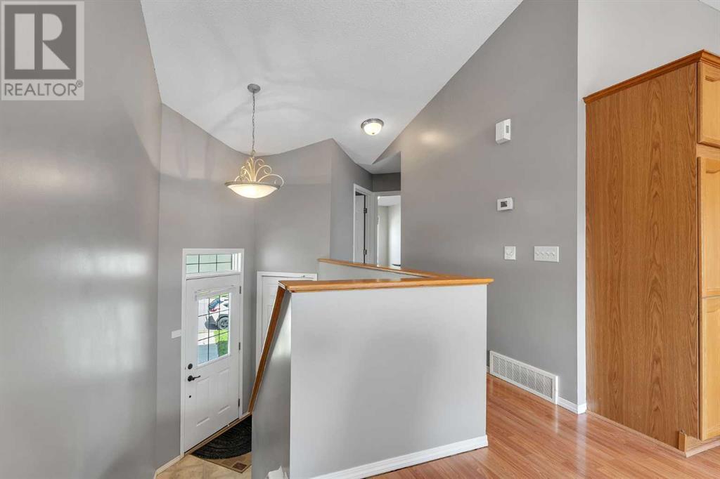 Single Family House Bi-level for Sale in  Covehaven Court NE Coventry Hills Calgary 