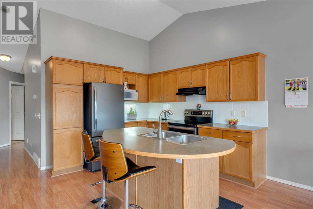Single Family House Bi-level for Sale in  Covehaven Court NE Coventry Hills Calgary 