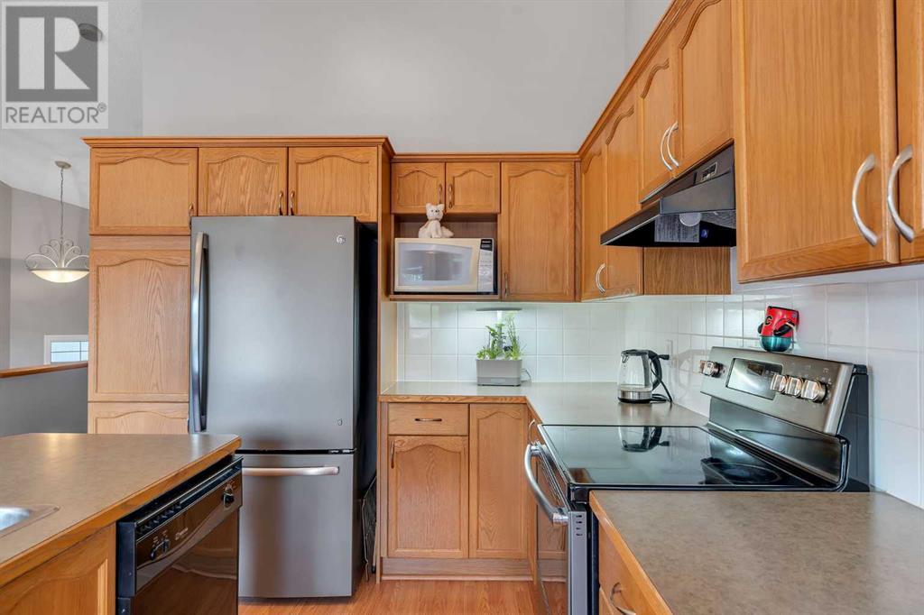 Single Family House Bi-level for Sale in  Covehaven Court NE Coventry Hills Calgary 
