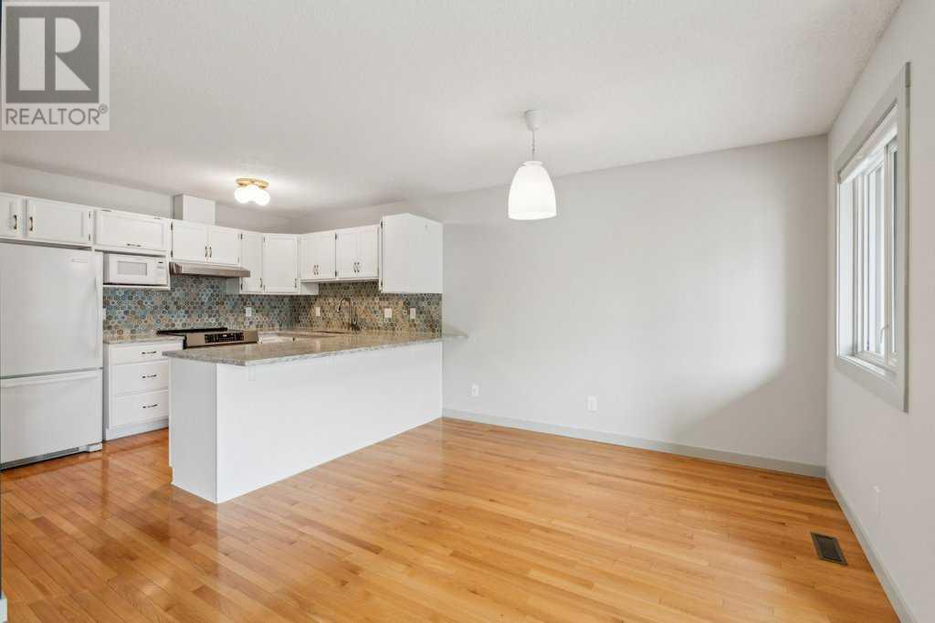 Single Family House Bungalow for Sale in  Coach Side Road SW Coach Hill Calgary 