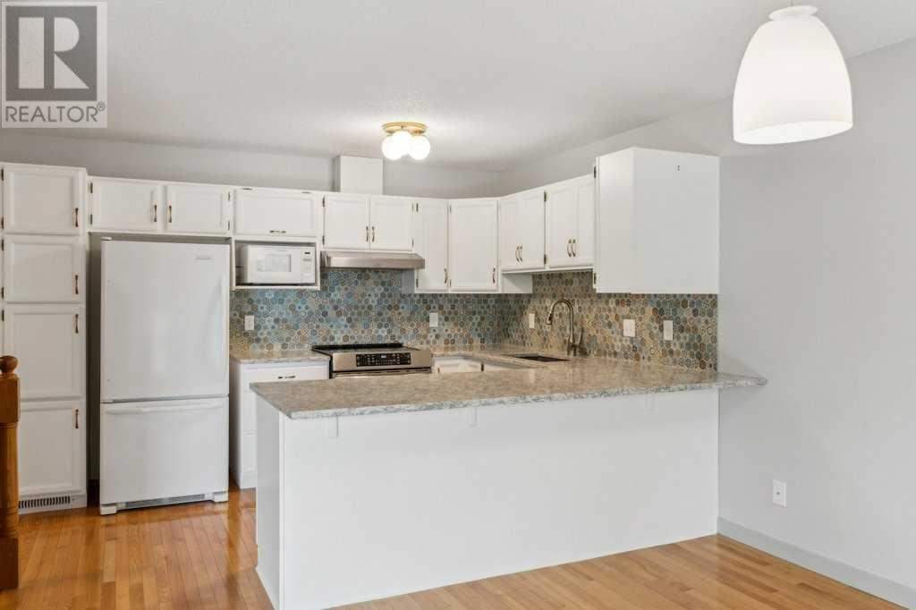 Single Family House Bungalow for Sale in  Coach Side Road SW Coach Hill Calgary 