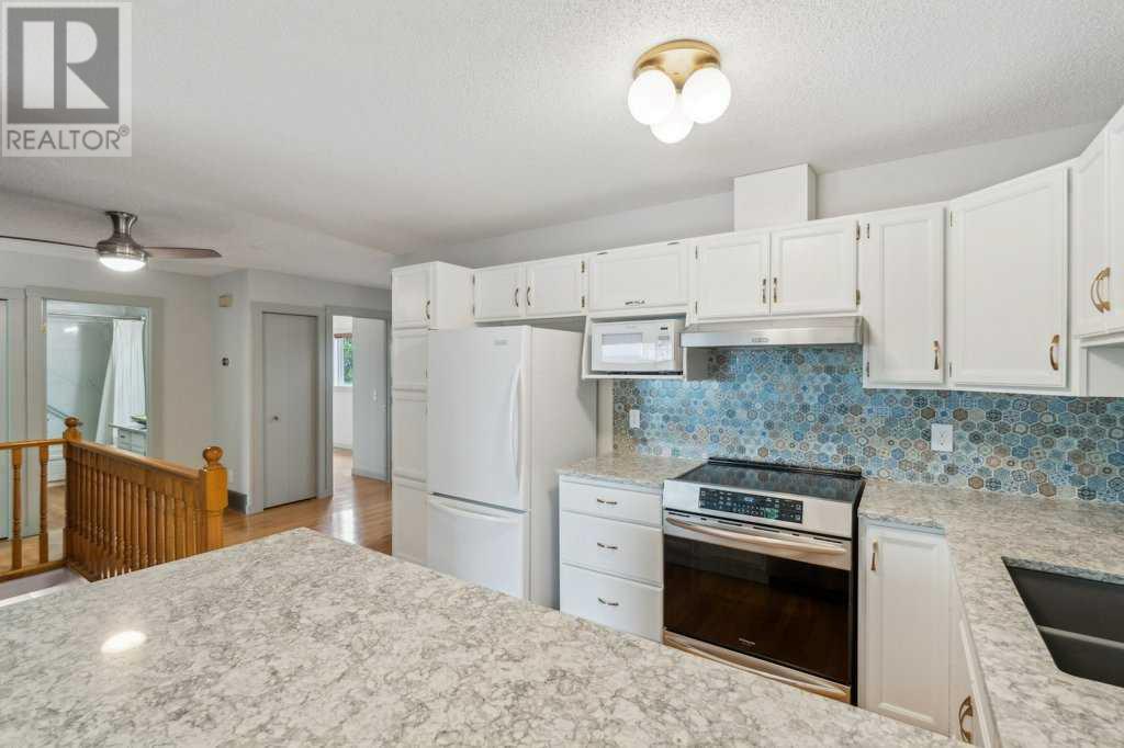 Single Family House Bungalow for Sale in  Coach Side Road SW Coach Hill Calgary 