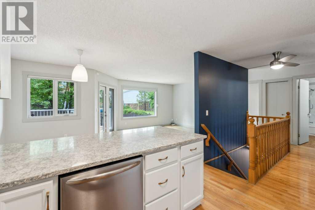 Single Family House Bungalow for Sale in  Coach Side Road SW Coach Hill Calgary 