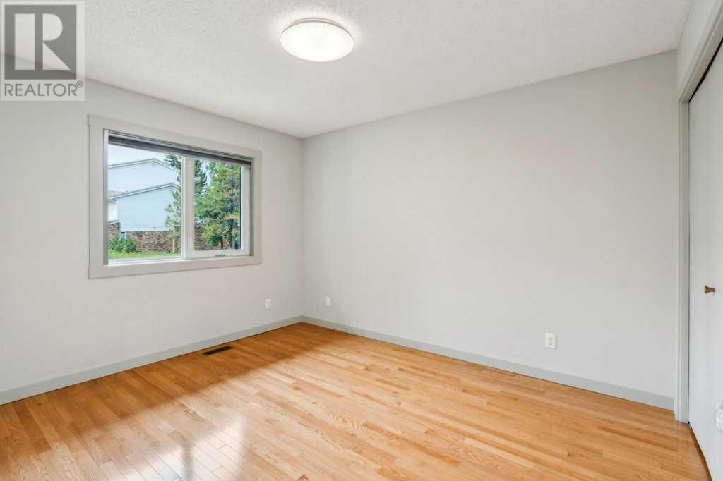 Single Family House Bungalow for Sale in  Coach Side Road SW Coach Hill Calgary 