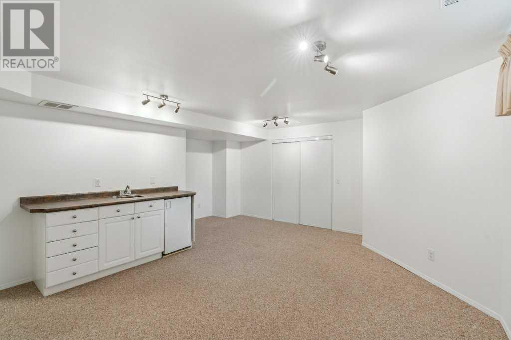 Single Family House Bungalow for Sale in  Coach Side Road SW Coach Hill Calgary 