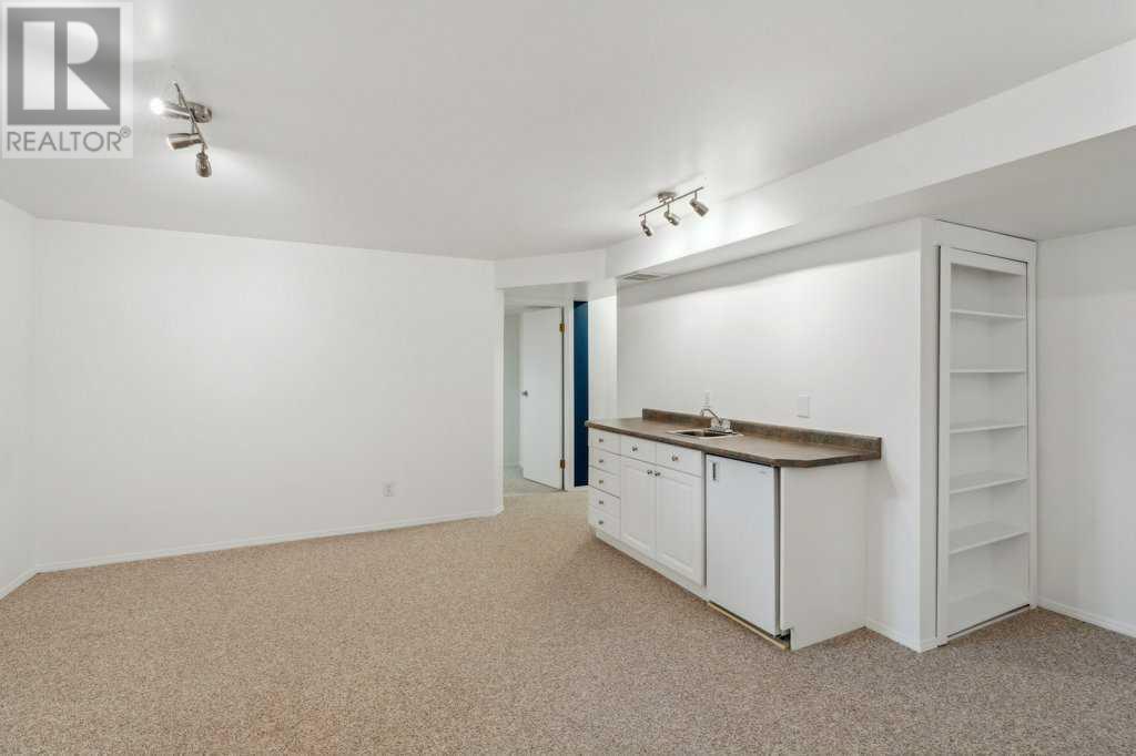 Single Family House Bungalow for Sale in  Coach Side Road SW Coach Hill Calgary 