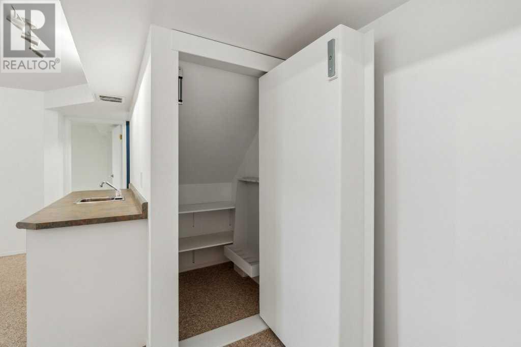 Single Family House Bungalow for Sale in  Coach Side Road SW Coach Hill Calgary 