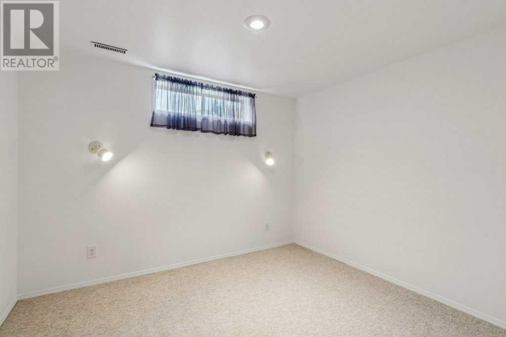 Single Family House Bungalow for Sale in  Coach Side Road SW Coach Hill Calgary 