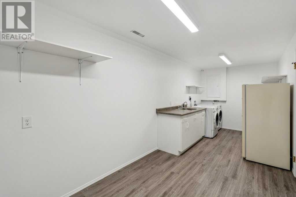 Single Family House Bungalow for Sale in  Coach Side Road SW Coach Hill Calgary 