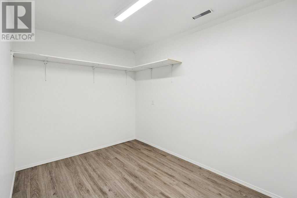 Single Family House Bungalow for Sale in  Coach Side Road SW Coach Hill Calgary 