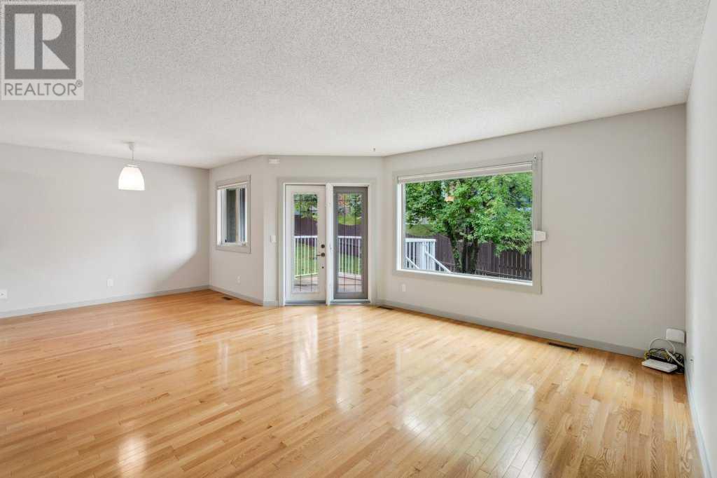 Single Family House Bungalow for Sale in  Coach Side Road SW Coach Hill Calgary 