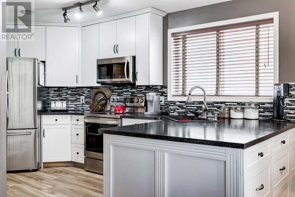Single Family House Bi-level for Sale in  Covehaven Road NE Coventry Hills Calgary 