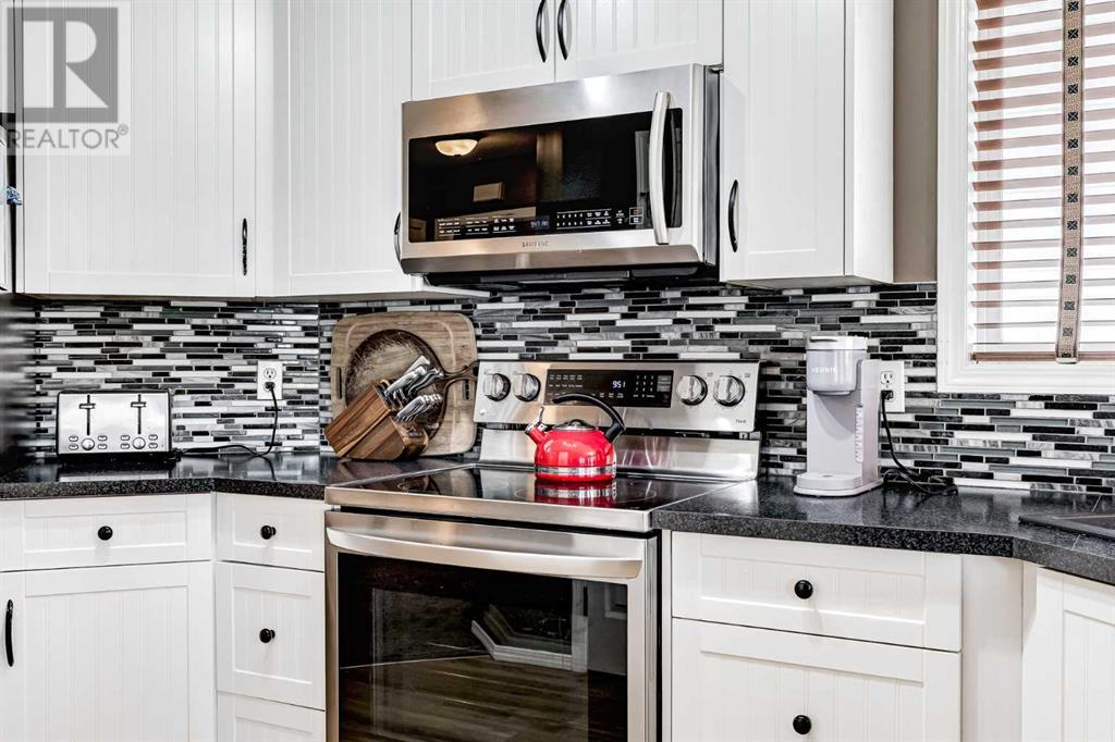 Single Family House Bi-level for Sale in  Covehaven Road NE Coventry Hills Calgary 