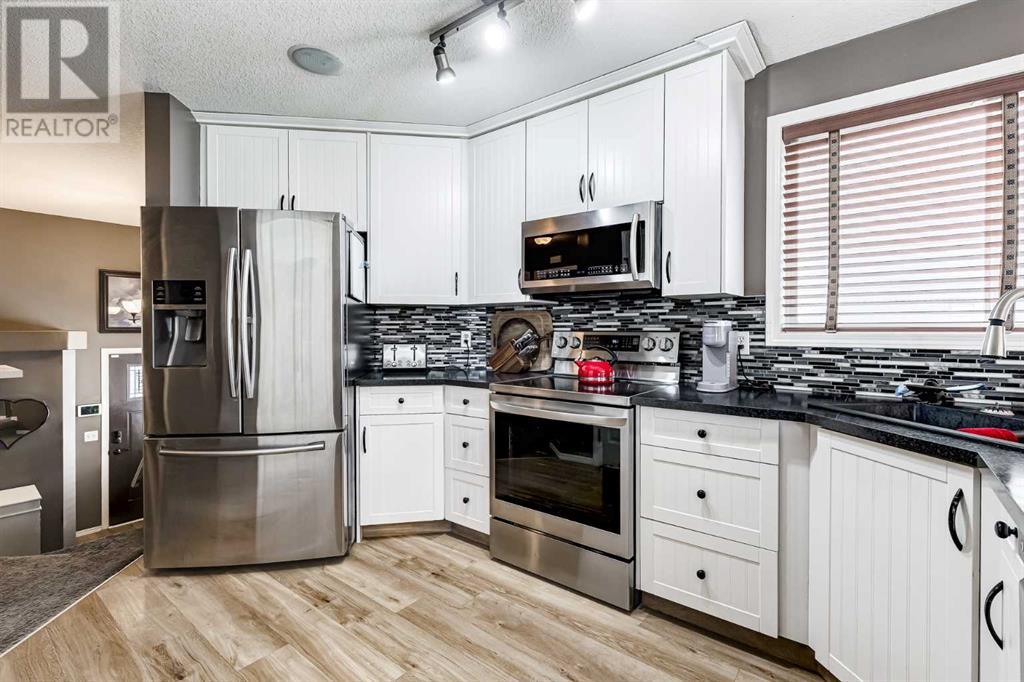 Single Family House Bi-level for Sale in  Covehaven Road NE Coventry Hills Calgary 