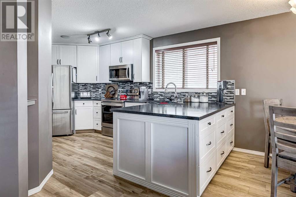Single Family House Bi-level for Sale in  Covehaven Road NE Coventry Hills Calgary 