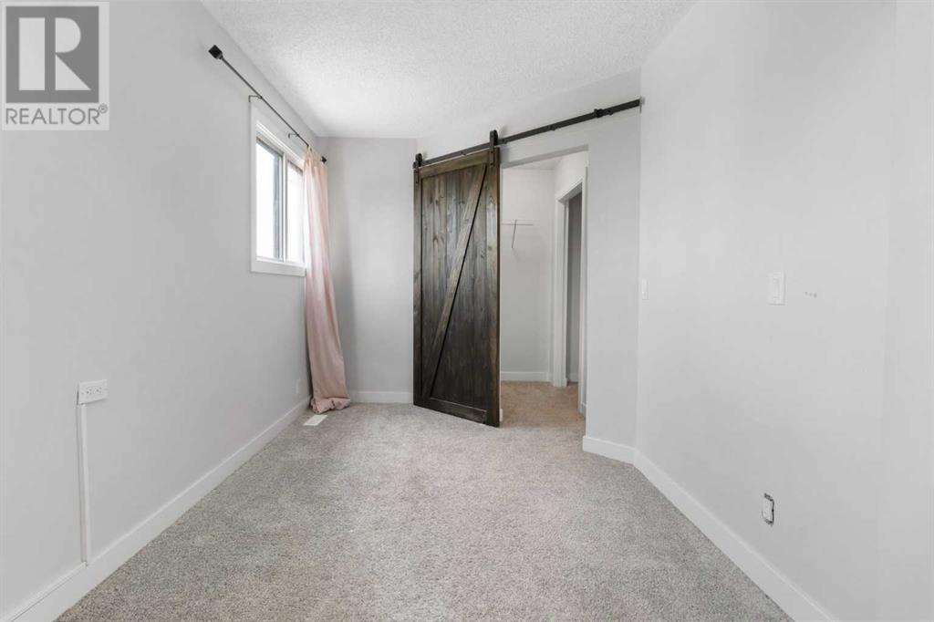 Single Family House Bi-level for Sale in  Macewan Glen Drive NW MacEwan Glen Calgary 