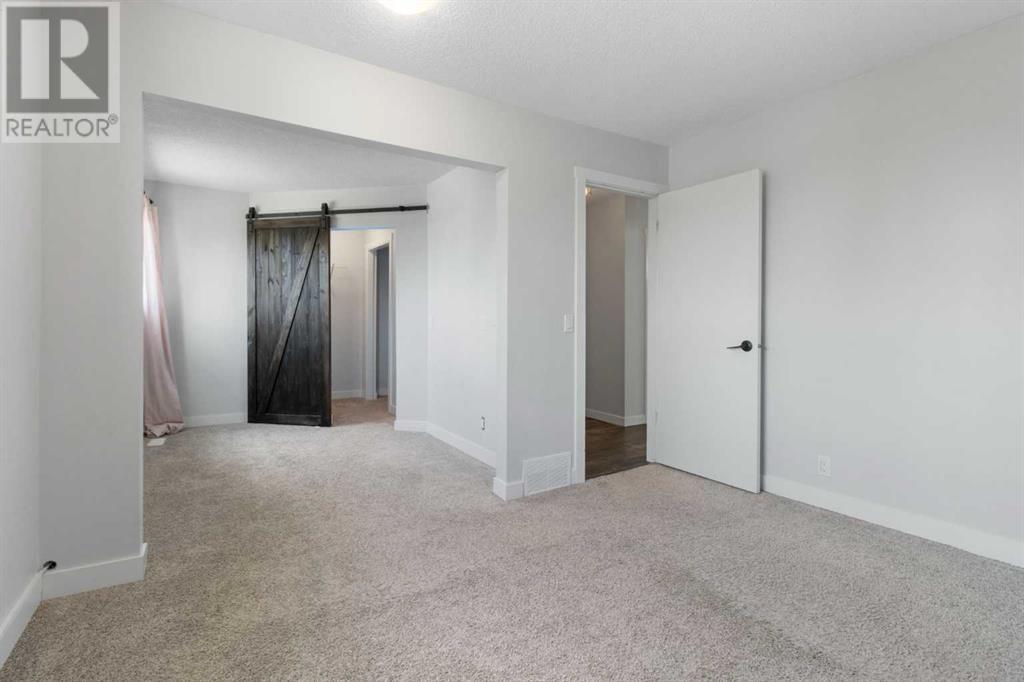 Single Family House Bi-level for Sale in  Macewan Glen Drive NW MacEwan Glen Calgary 