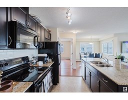 Laundry room - #415 12650 142 Av Nw, Edmonton, AB T5X0J4 Photo 6