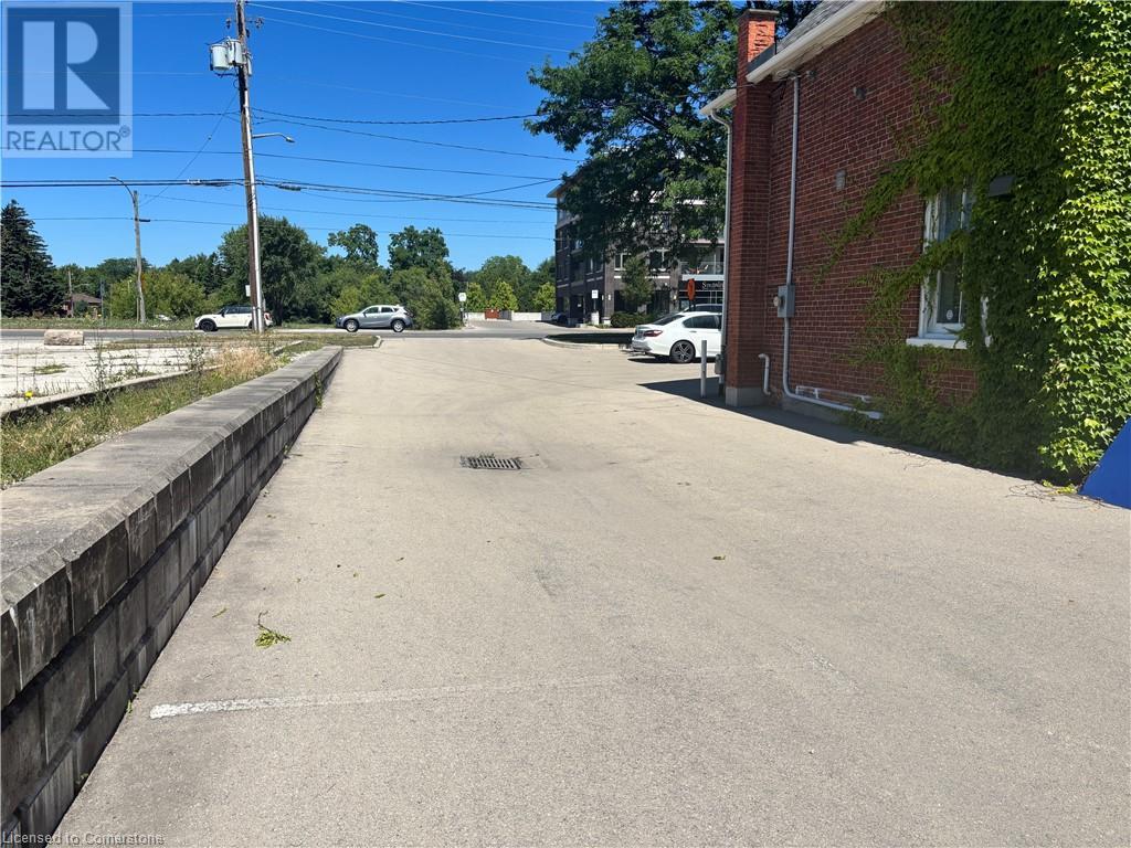 Photo 2 of 446 Plains Road E, Burlington ON