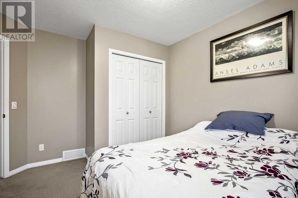 Photo 20 of 90 Cimarron Trail, Okotoks AB