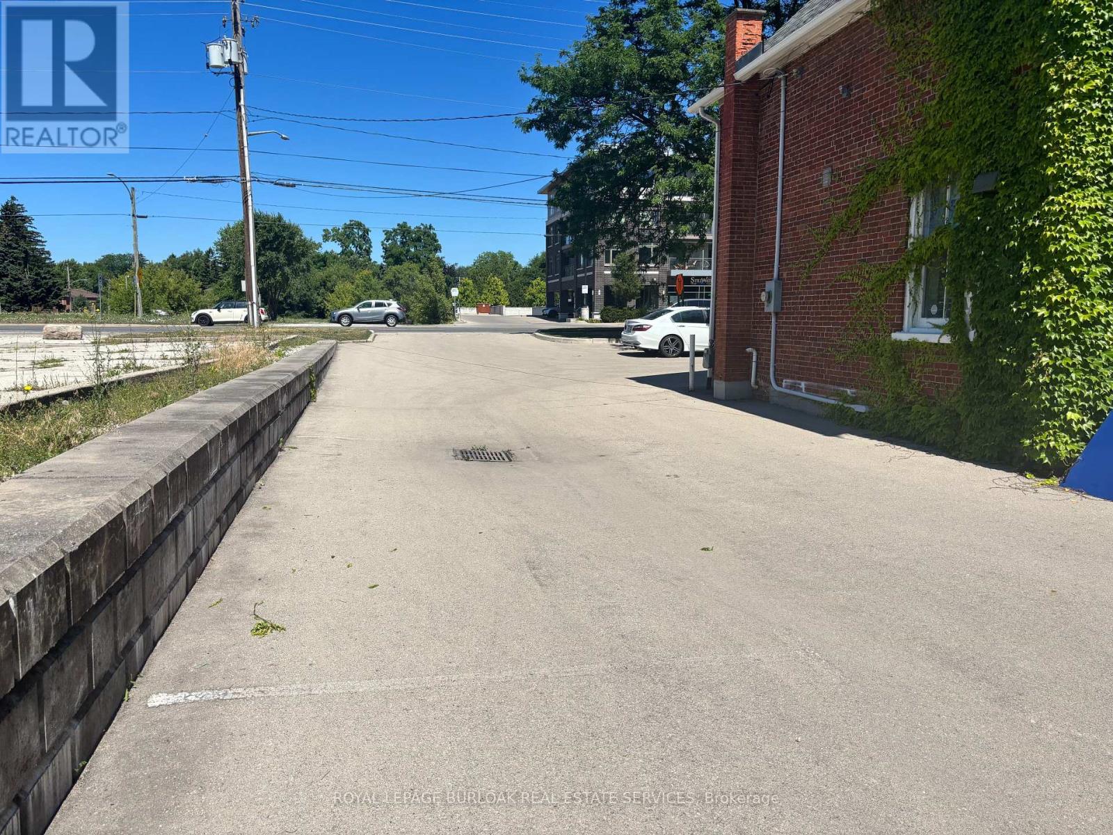Photo 1 of 446 Plains Road E, Burlington ON