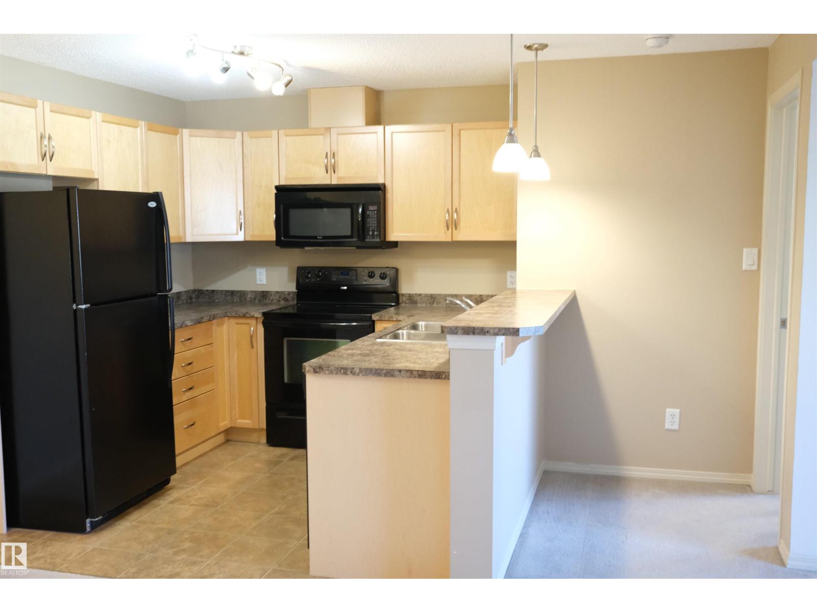 Photo 11 of 223 5951 165 Av Nw, Edmonton AB