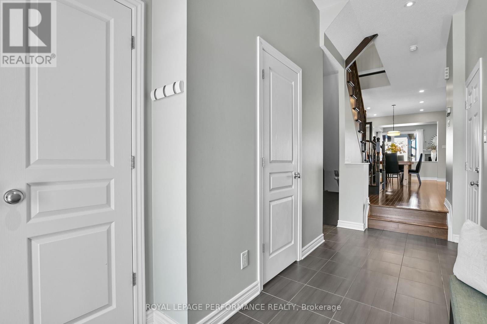 Double door closet for coats & footwear.