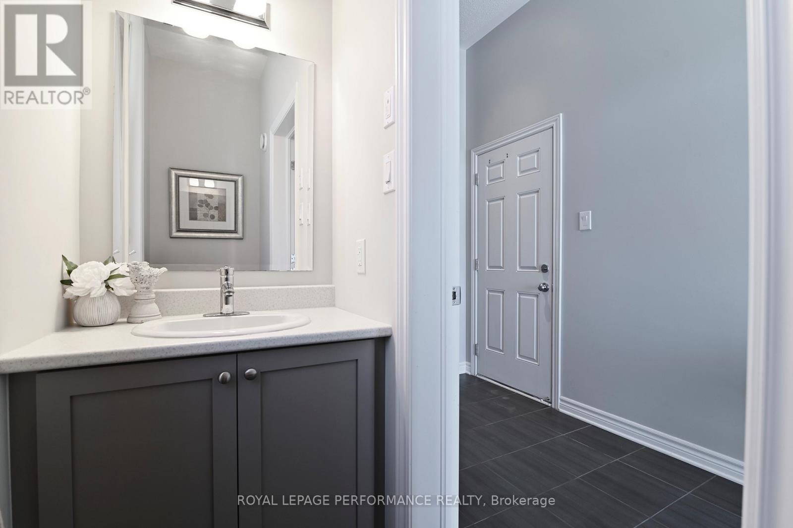 Powder room away from living spaces.