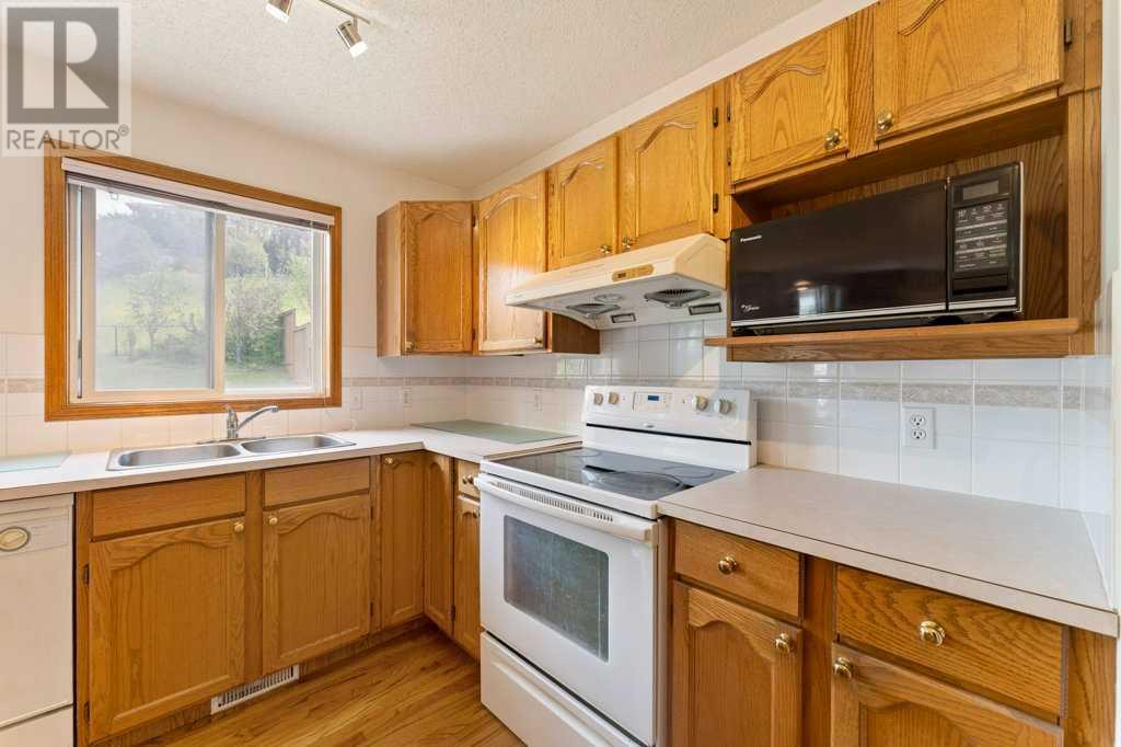 Photo 10 of 62 Edgebrook Heights Nw, Calgary AB