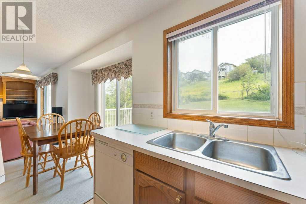 Photo 11 of 62 Edgebrook Heights Nw, Calgary AB