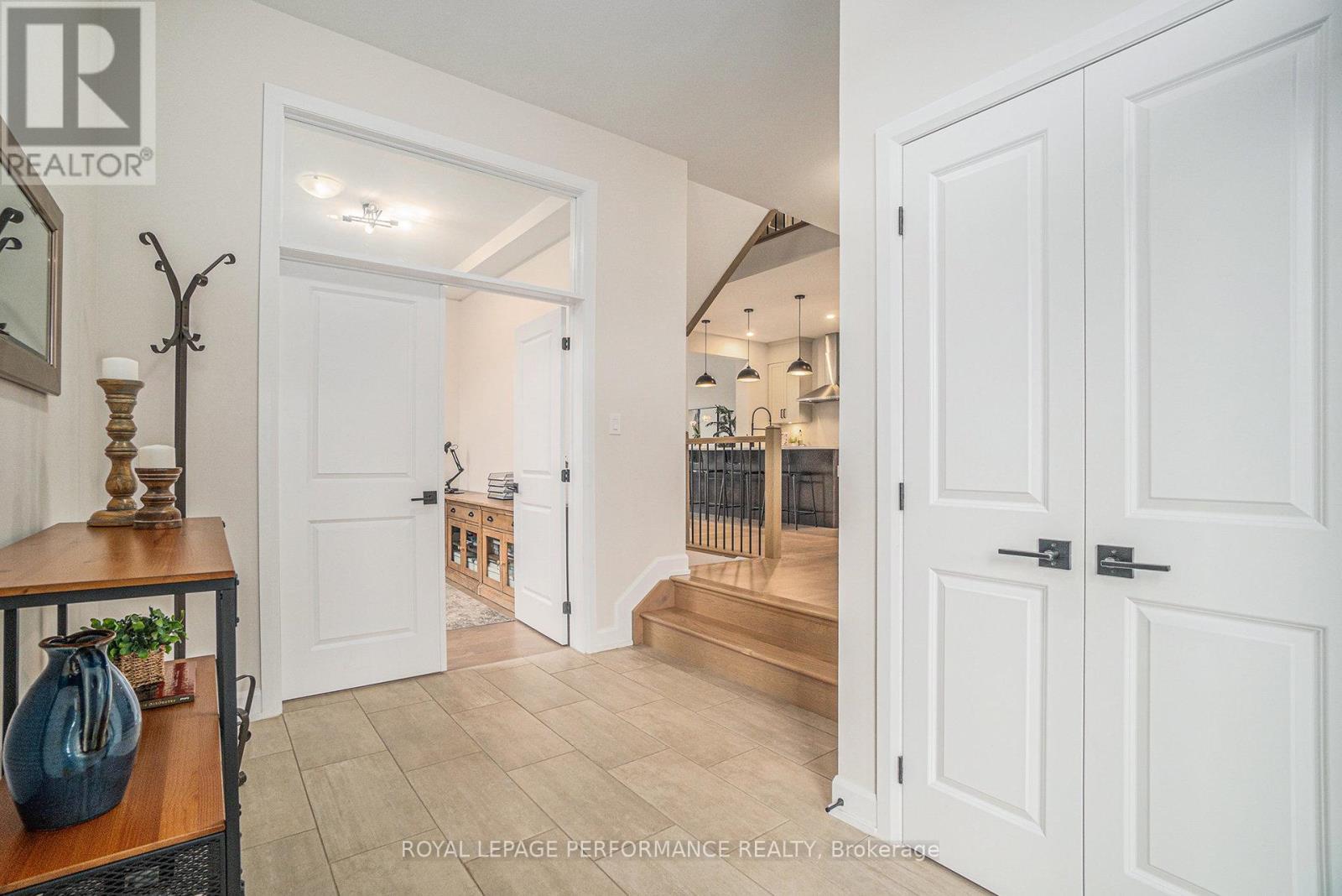 Spacious Entry Leading To The Main Floor Den