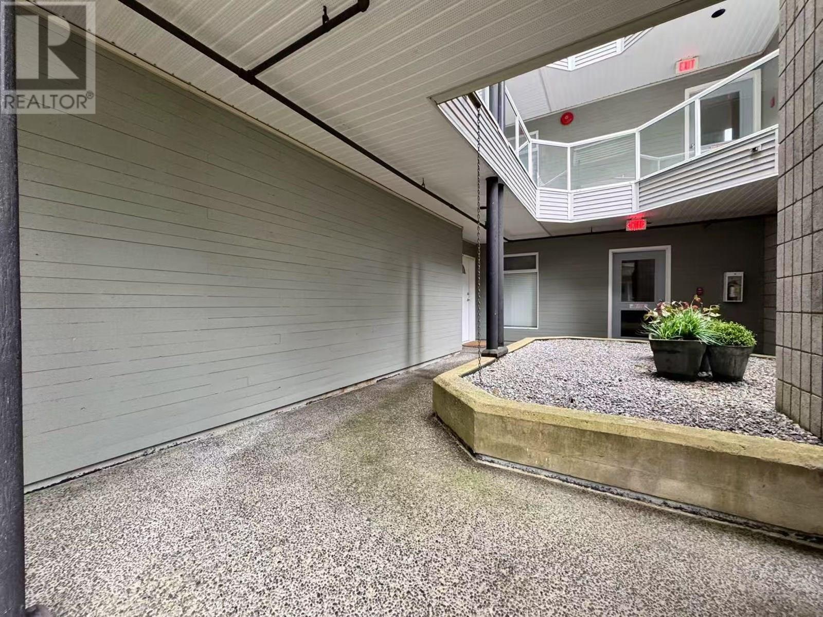 Photo 6 of 103 2733 Atlin Place, Coquitlam BC