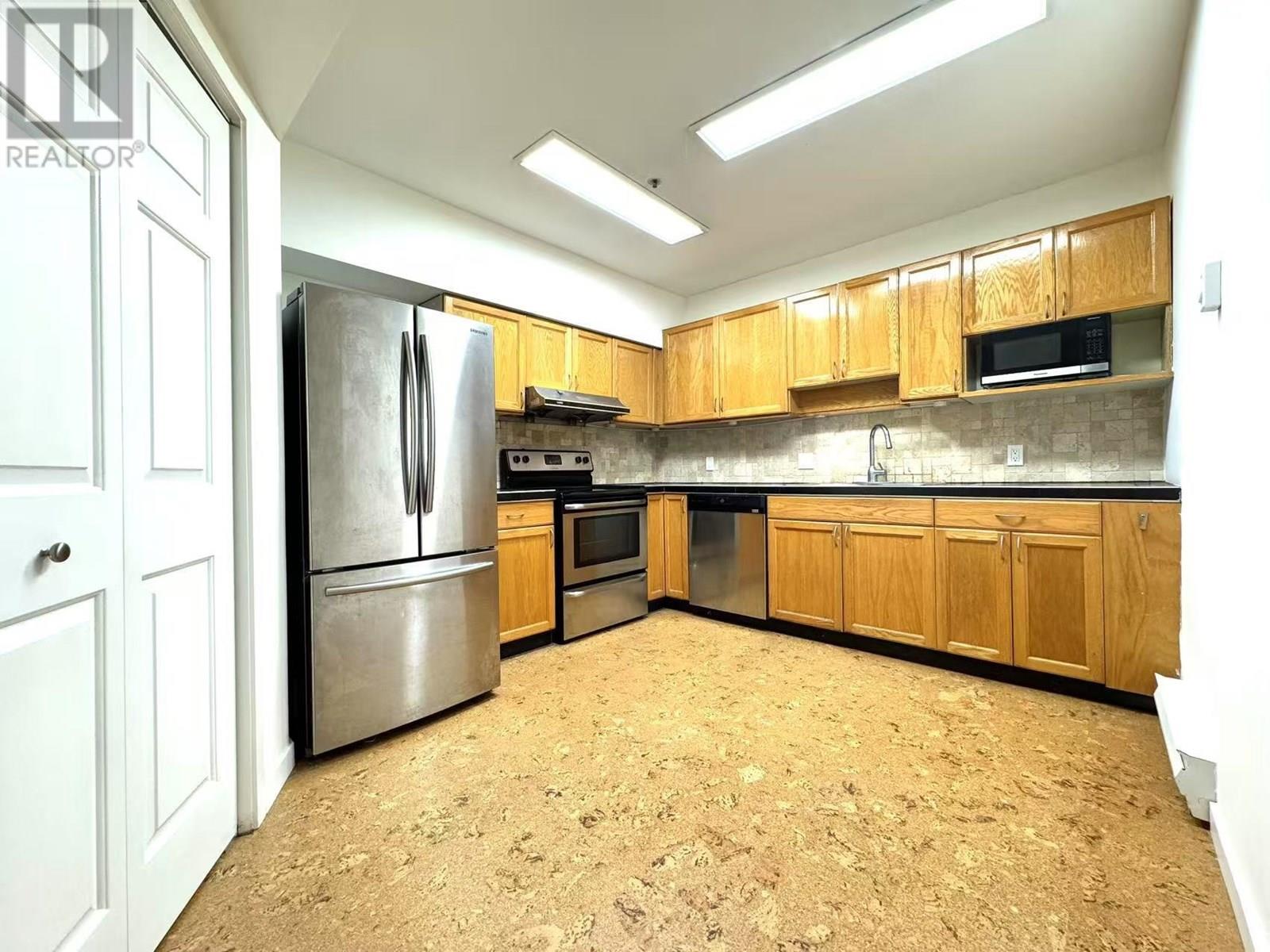 Photo 10 of 103 2733 Atlin Place, Coquitlam BC