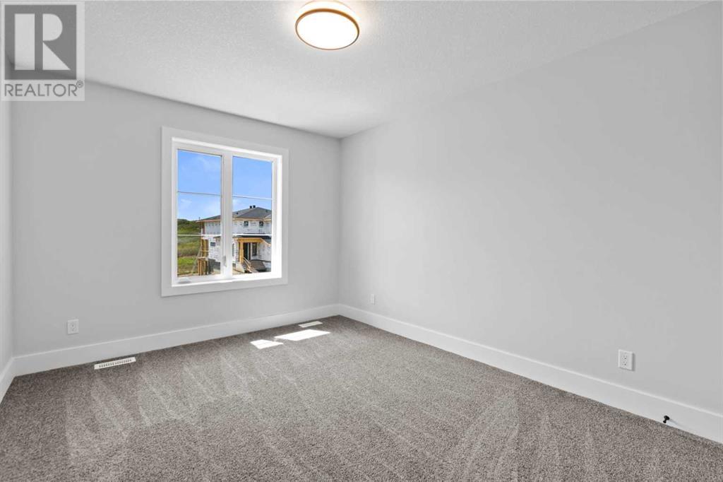 Photo 6 of 205 Creekstone Hill Sw, Calgary AB