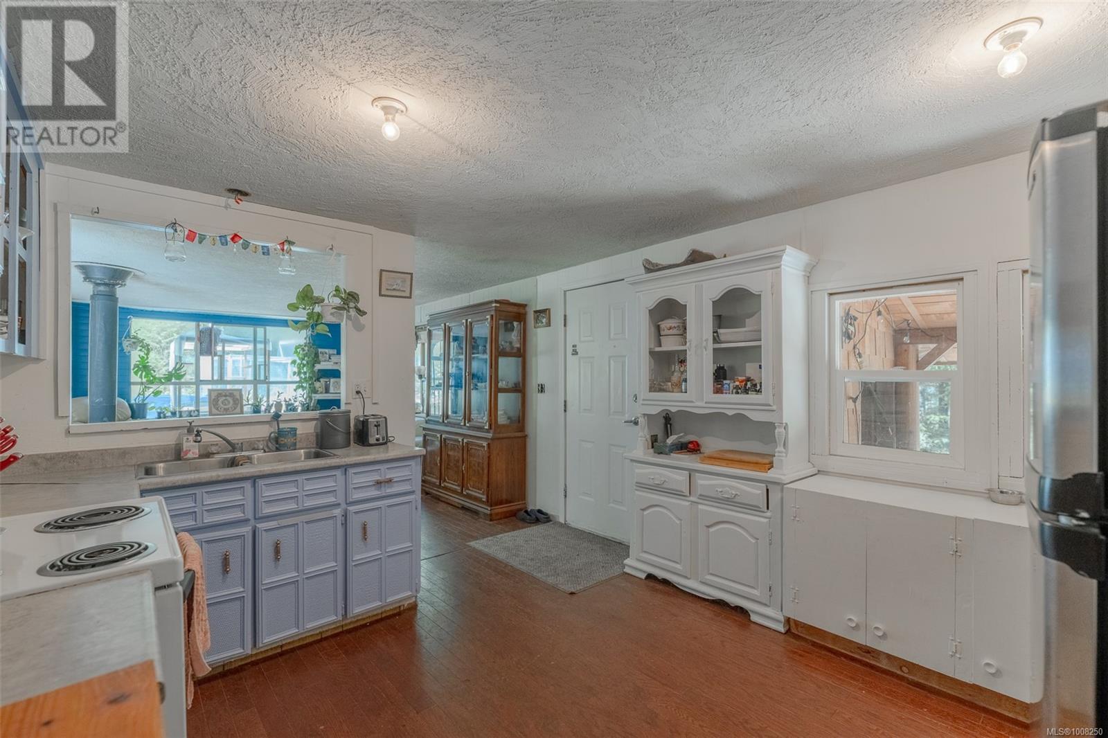 Photo 24 of 300 Oakdowne Rd, Qualicum Beach BC