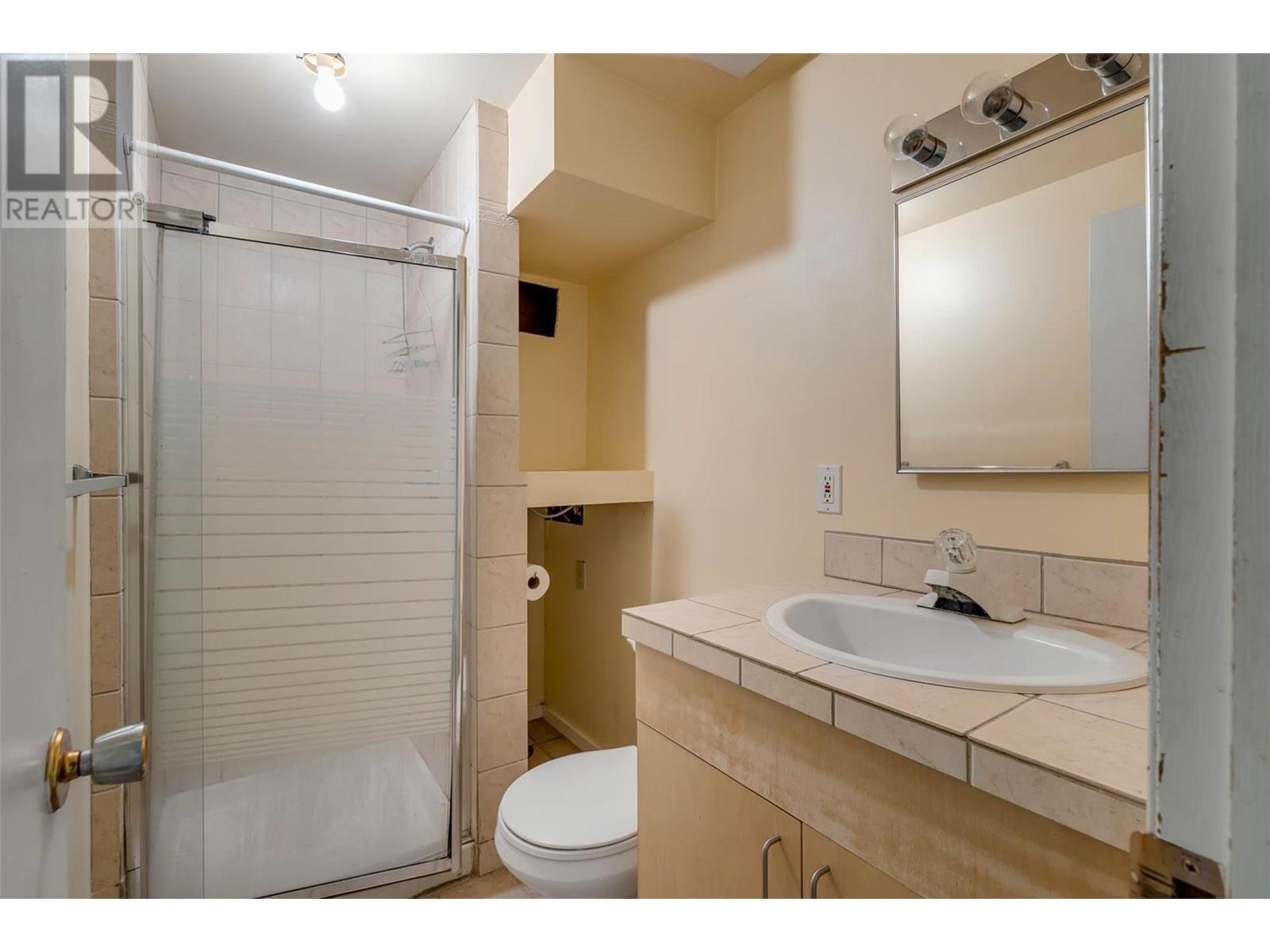 Photo 6 of 215 Mugford Road, Kelowna BC