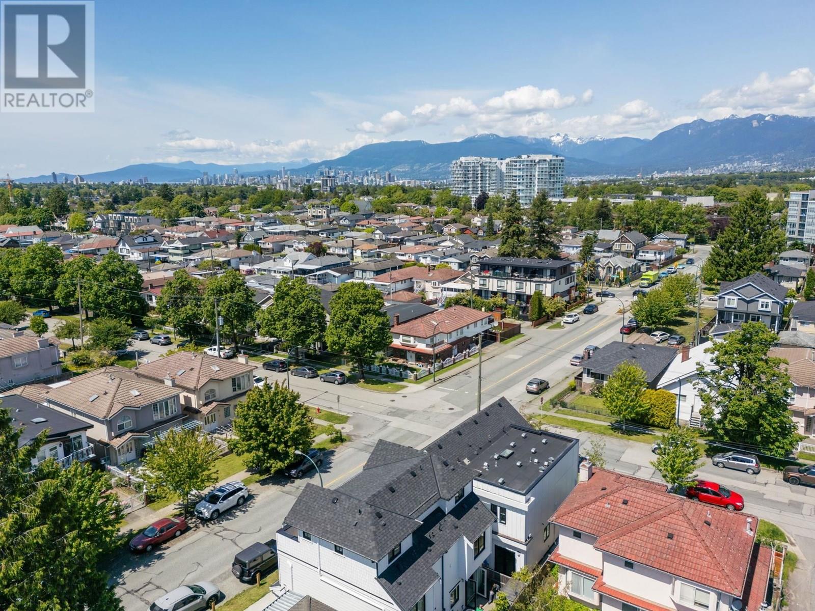 Photo 4 of 5018 Nanaimo Street, Vancouver BC