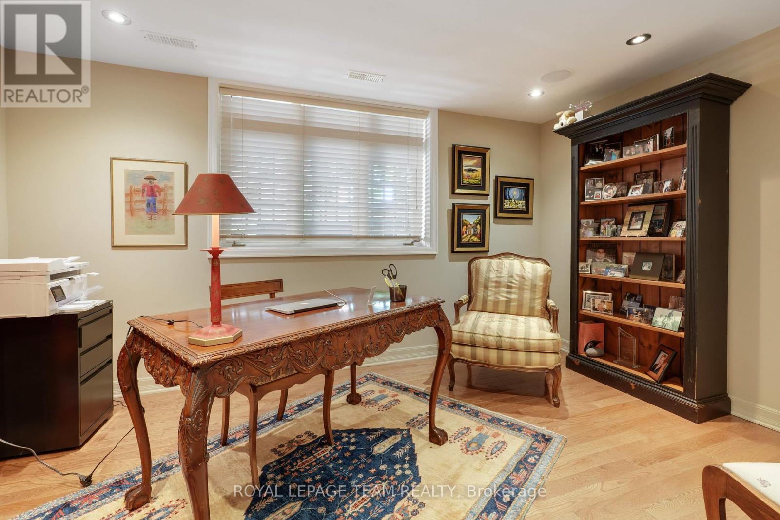 A den/office is located on the ground floor.