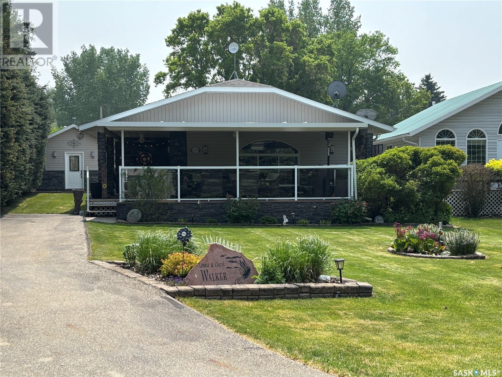 Photo 1 of 219 Sovereign Crescent, Coteau Beach SK