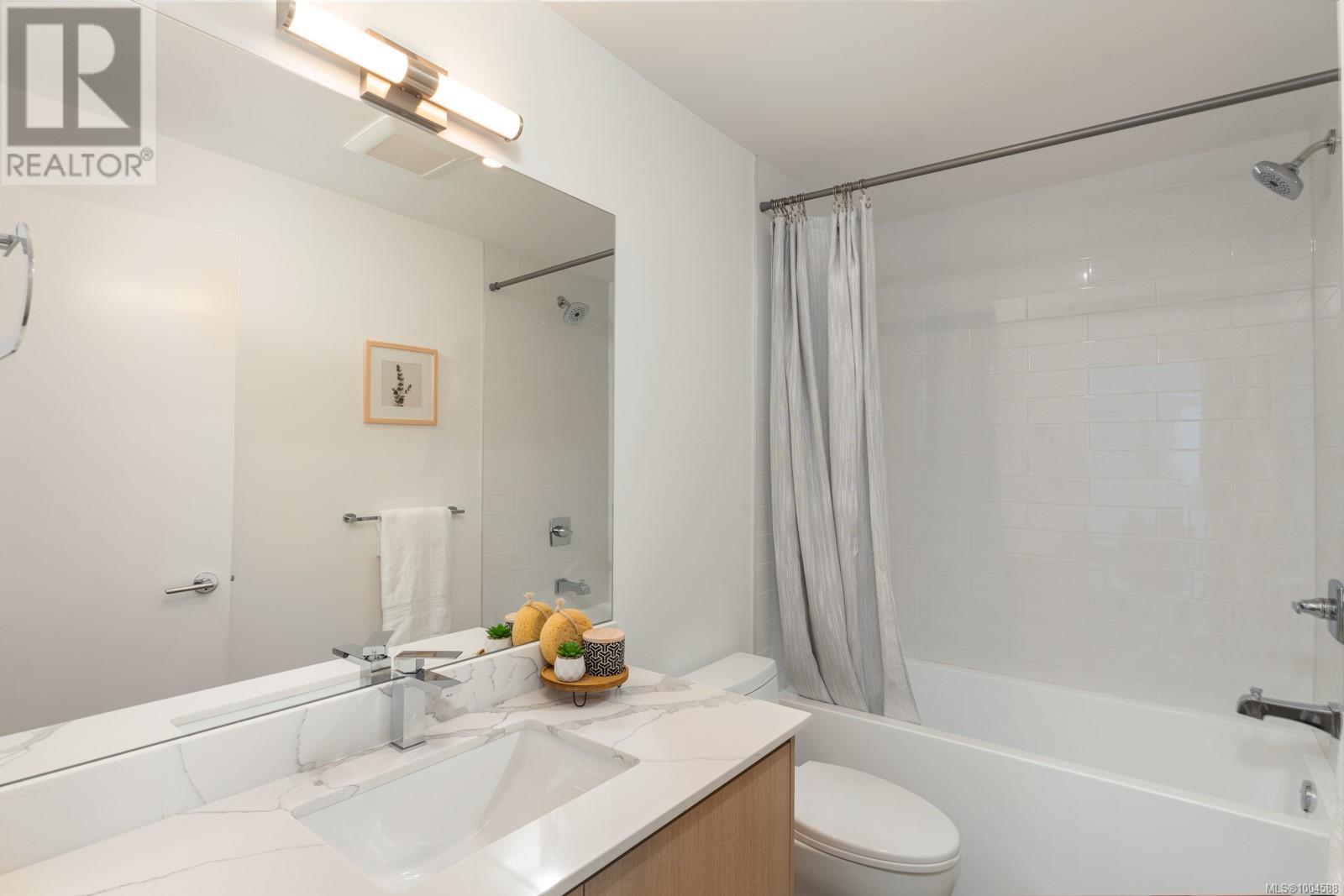 #404 258 HELMCKEN RD - 18