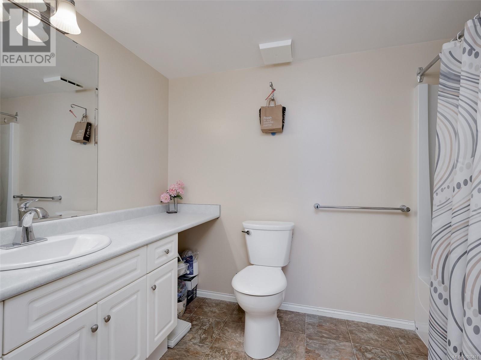 Photo 11 of 301 1521 Church Ave, Saanich BC