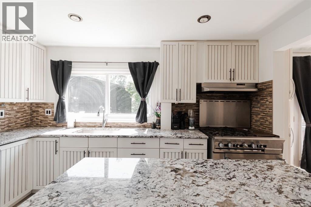 Photo 13 of 49 Poplar Crescent, Gregoire Lake Estates AB