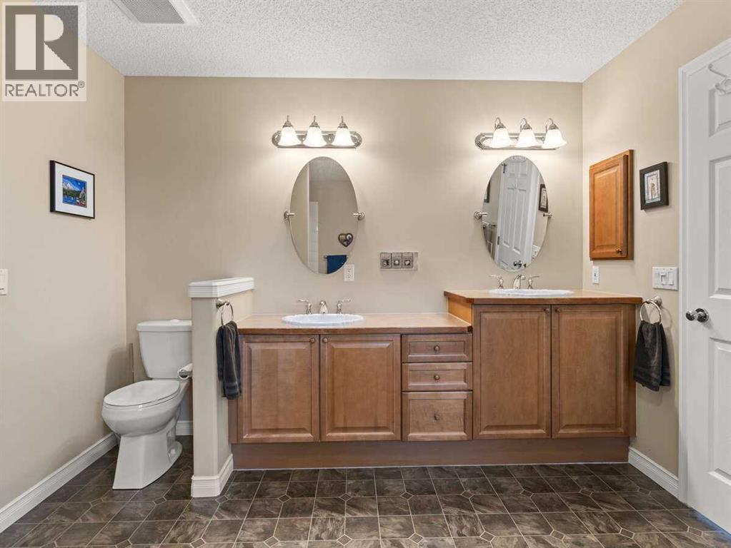 Photo 27 of 257 Crystal Shores Drive, Okotoks AB