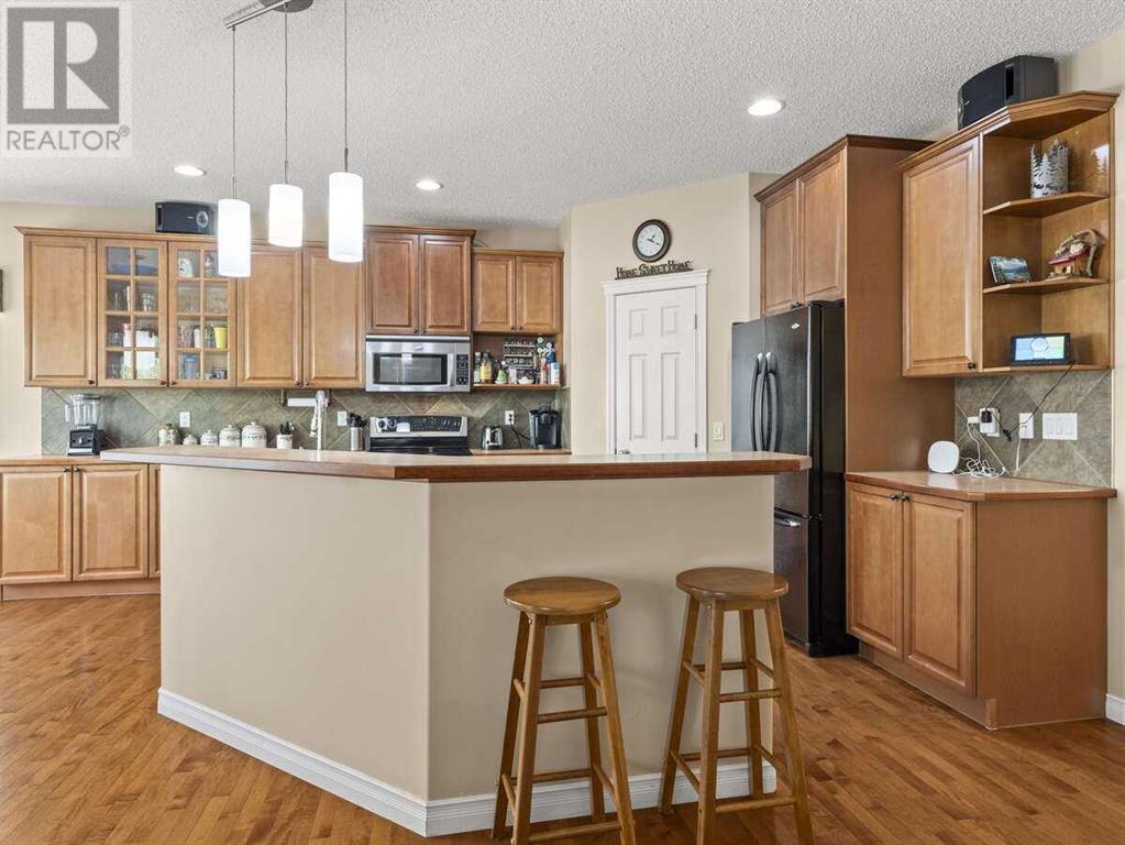 Photo 16 of 257 Crystal Shores Drive, Okotoks AB