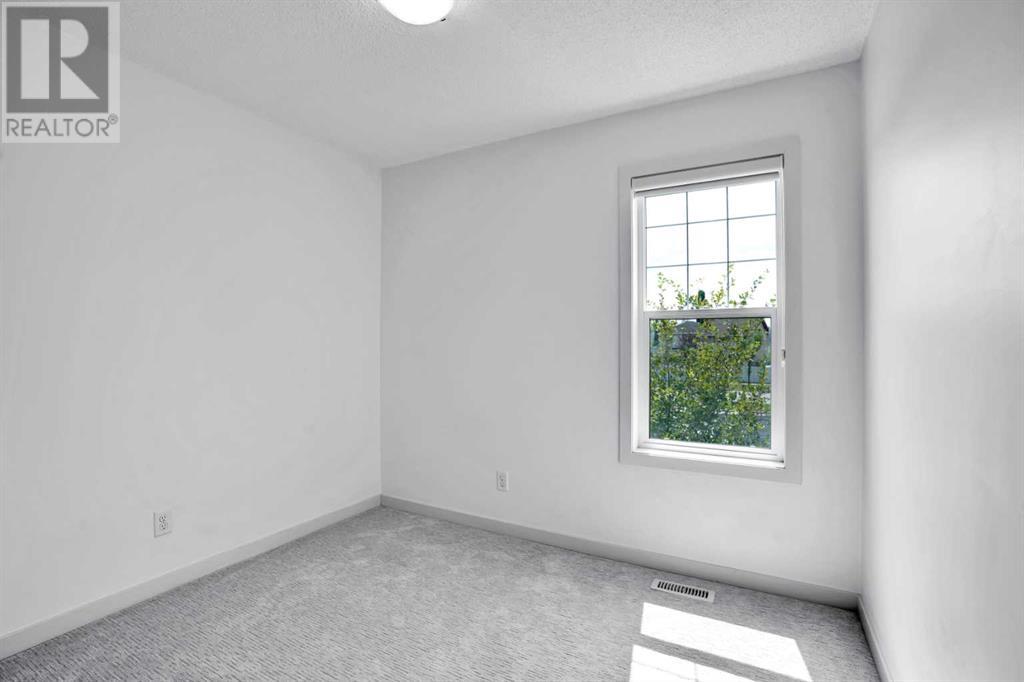 Photo 18 of 1223 New Brighton Park Se, Calgary AB