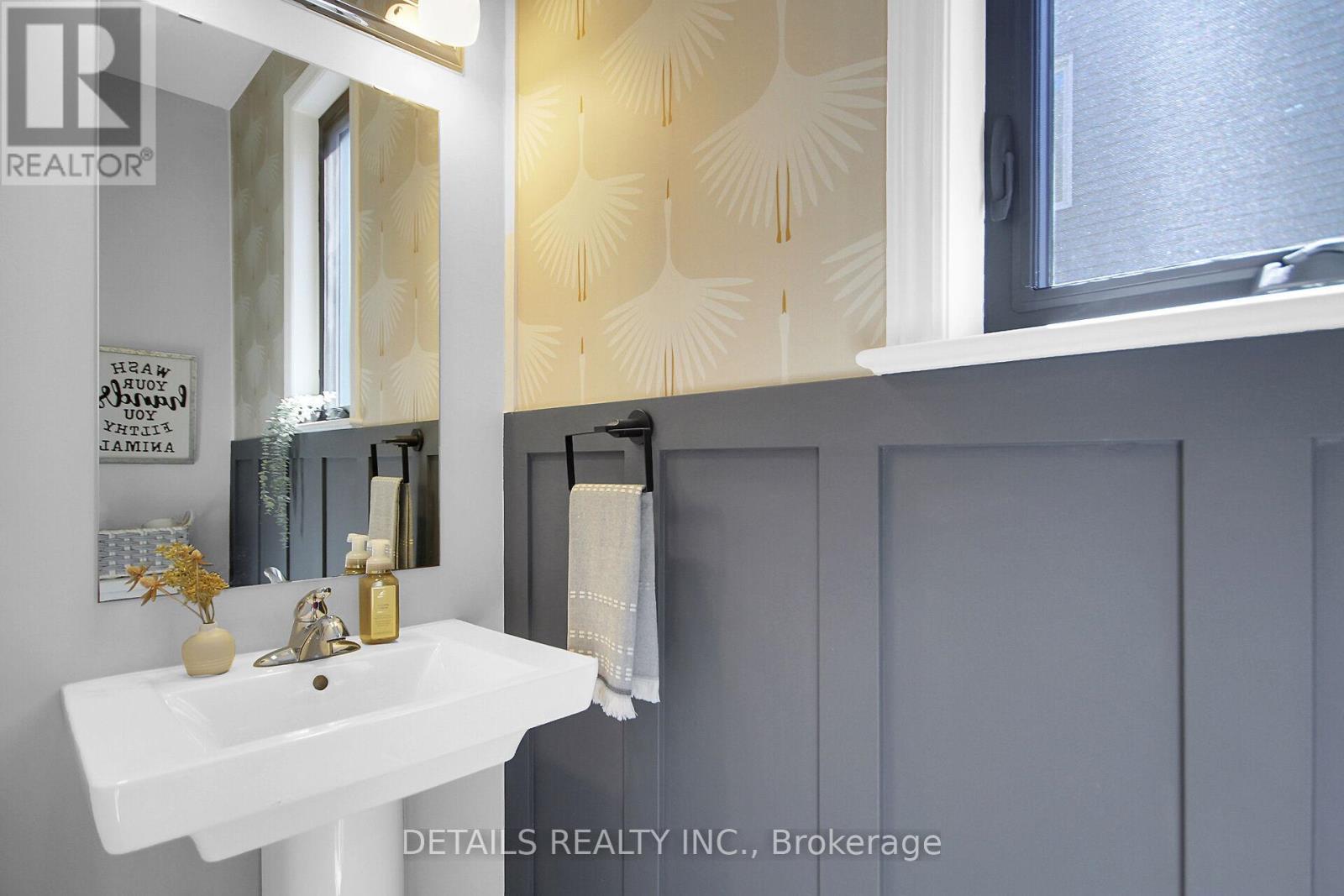 Stylish main level powder room.
