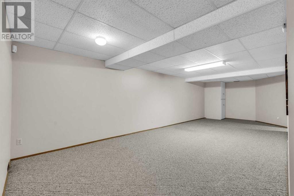 Single Family House for Sale in  Coach Side Terrace SW Coach Hill Calgary 